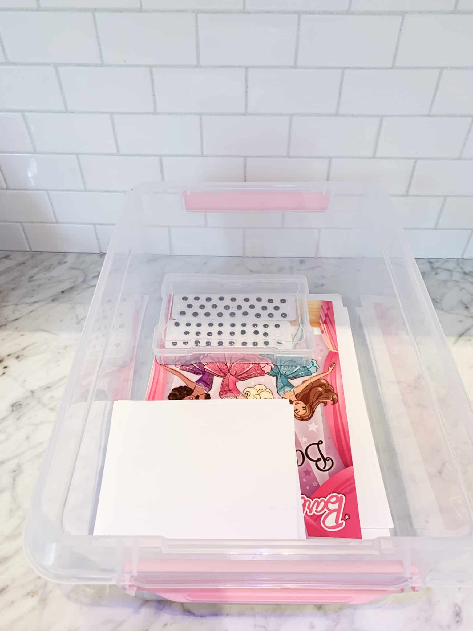 bin filled with craft supplies for kids