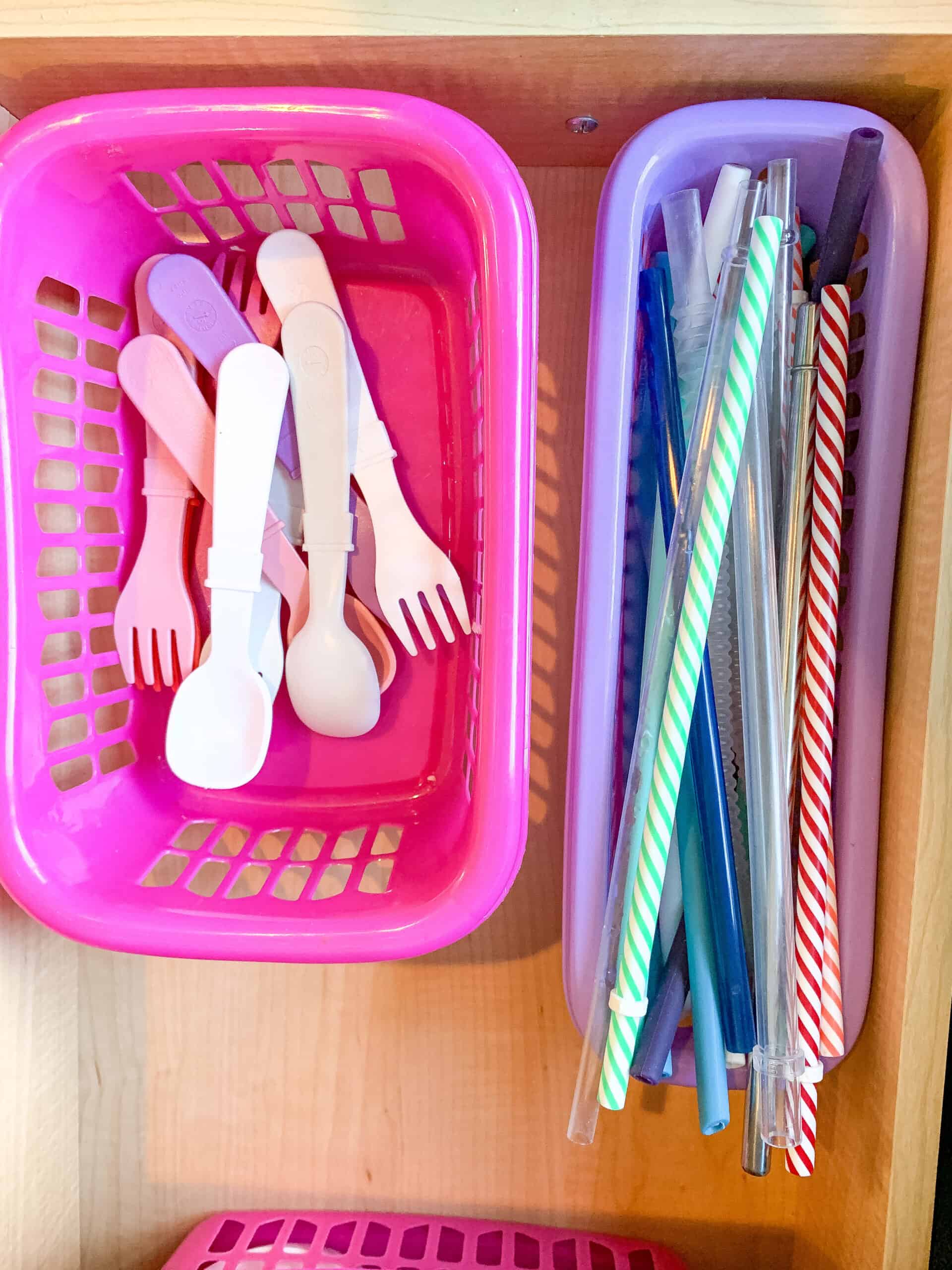 Drawer of kids utensils and straws