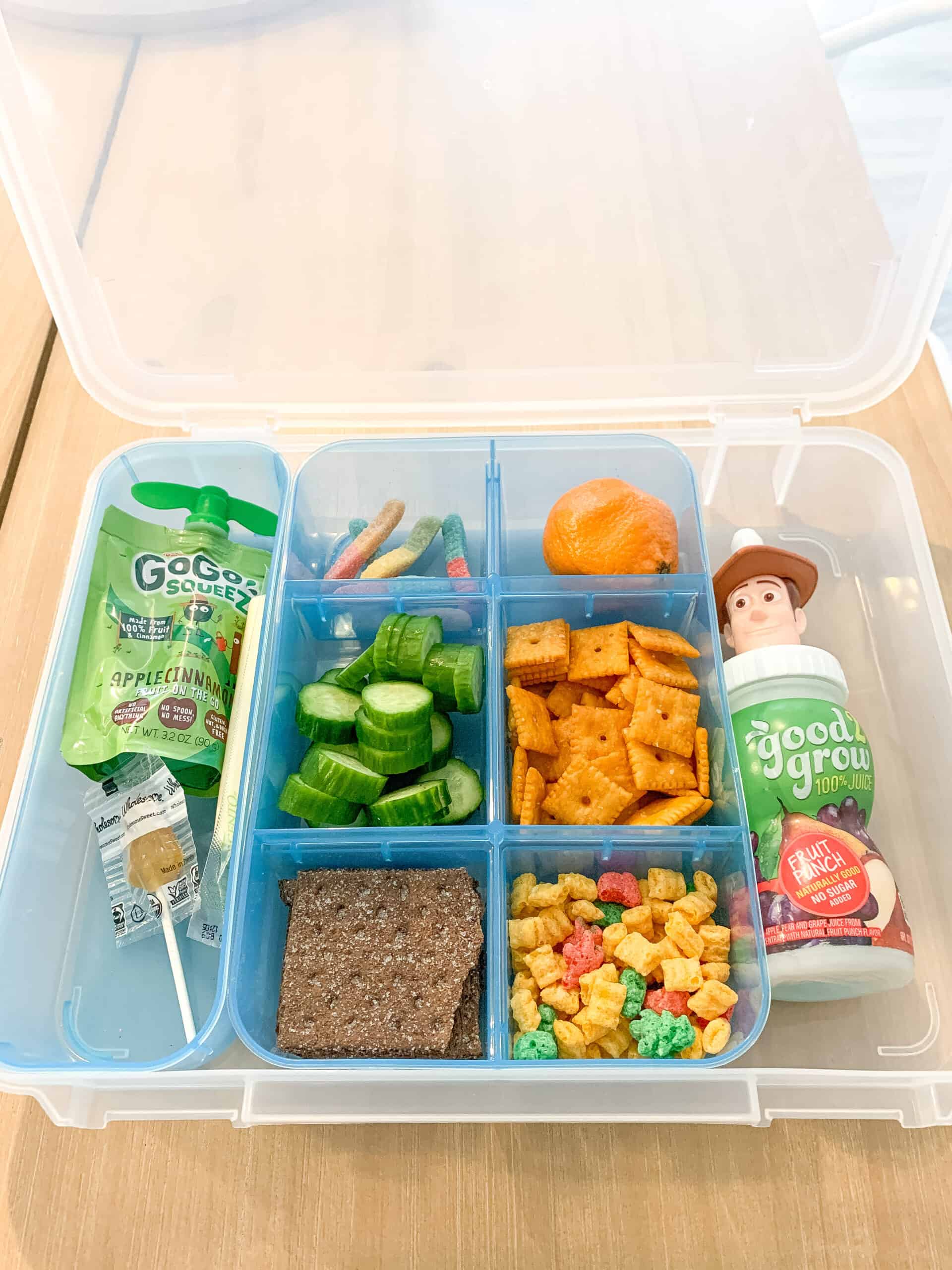 Plastic container with compartments for snacks