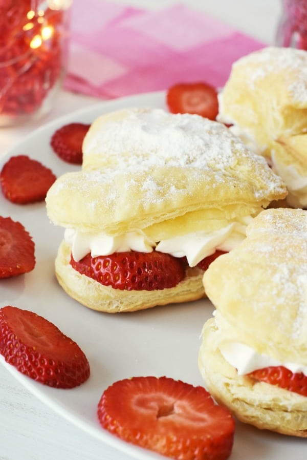 Heart shaped cream puffs with strawberry
