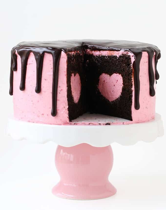 Pink and chocolate cake with heart in the middle