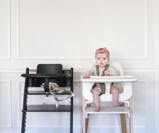 baby in Stokke Steps Highchair and Stokke Tripp Trapp