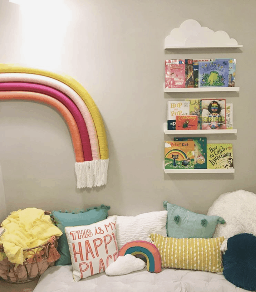 DIY rainbow on wall by book shelves