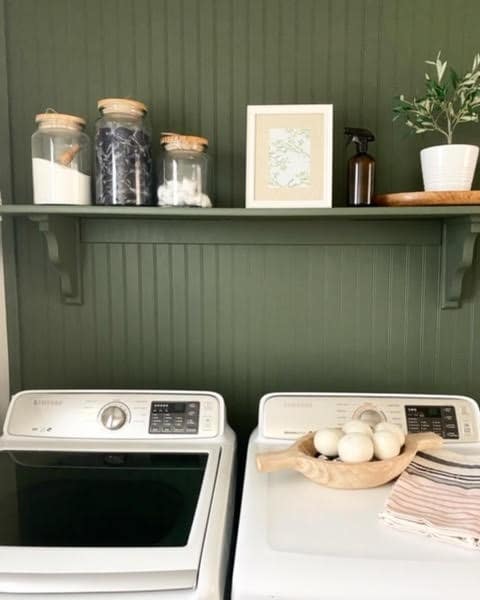 green wall in laundry room