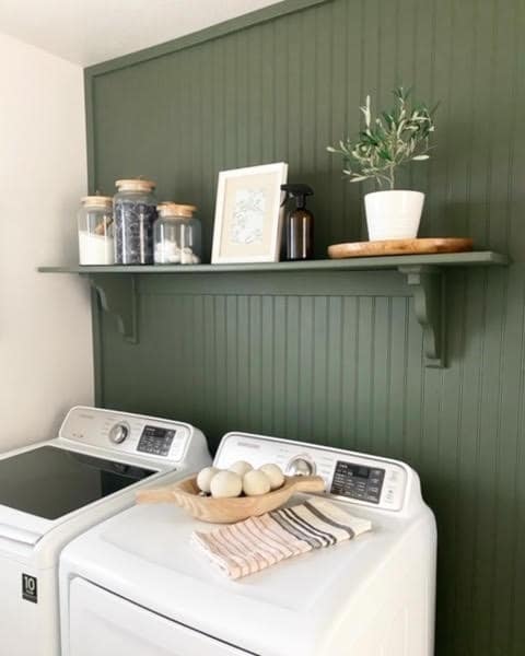 green wall in laundry room