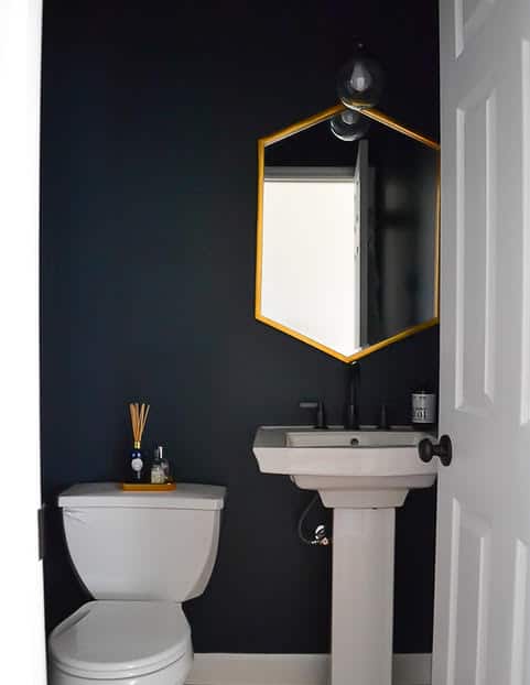 navy blue and gold powder room