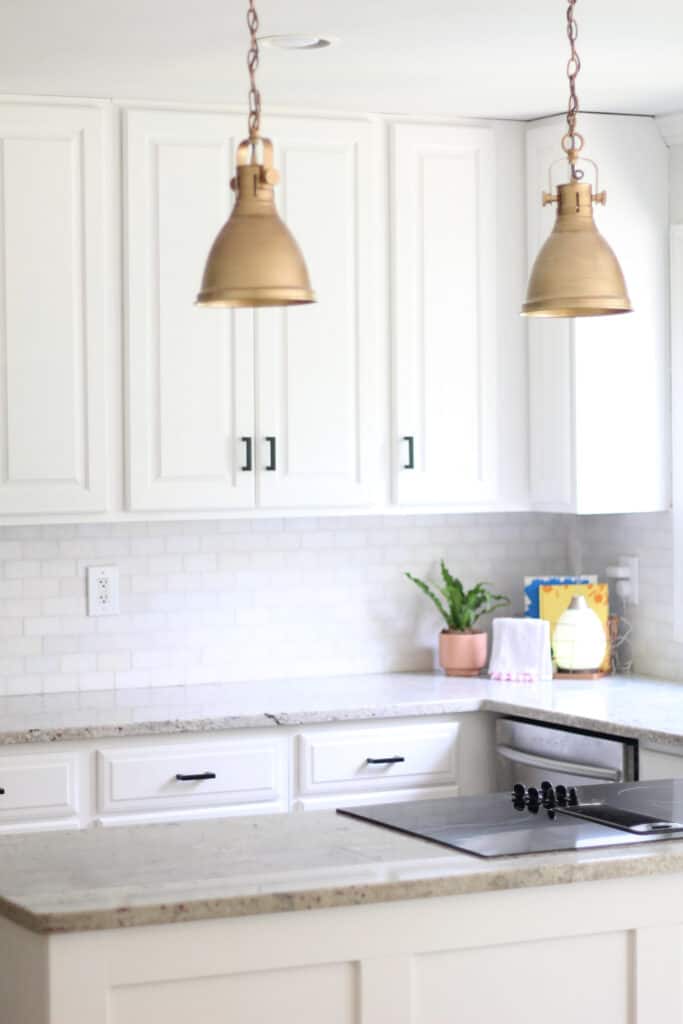 white kitchen with gold and black