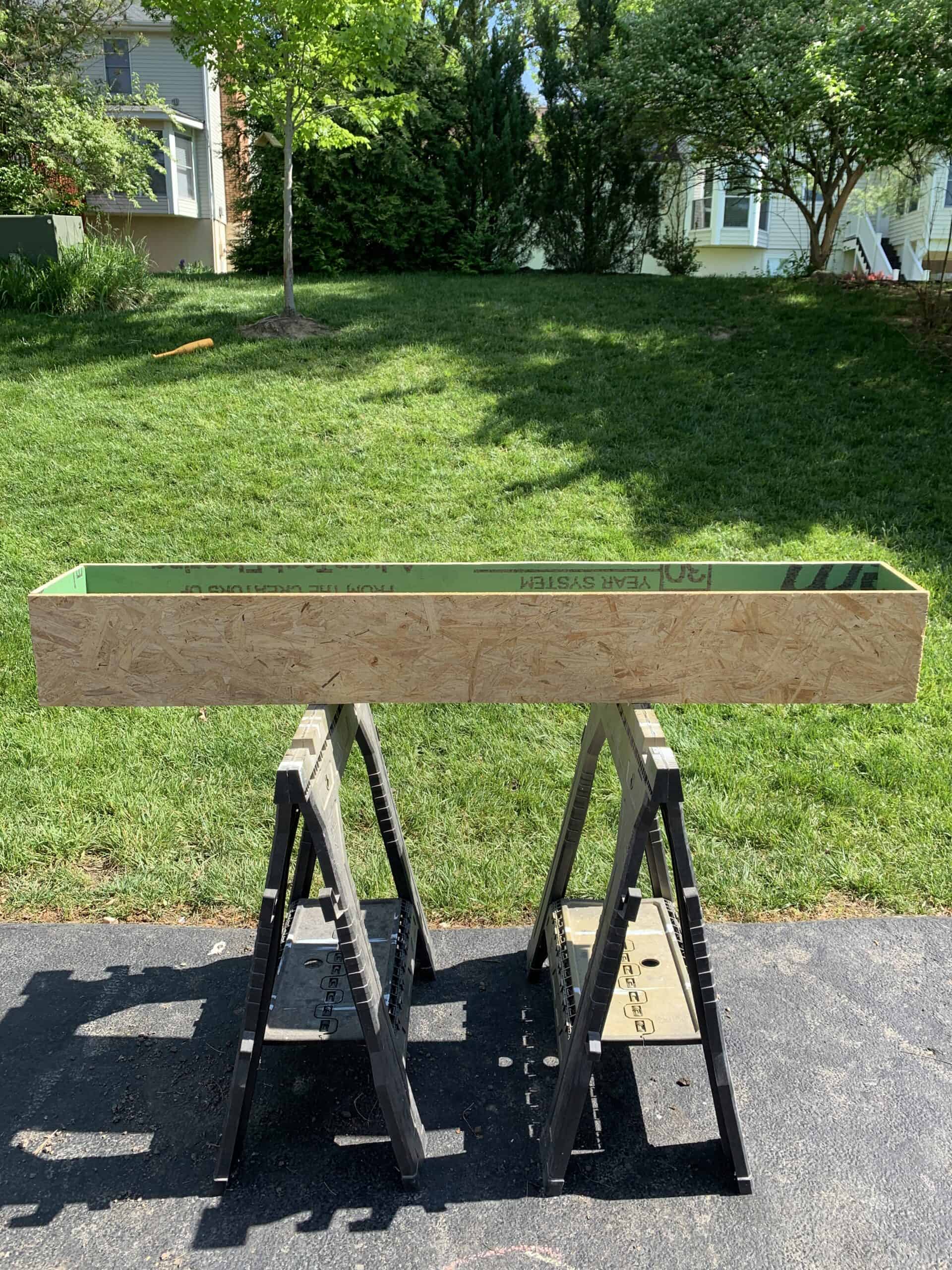 plywood planter box on saw horses