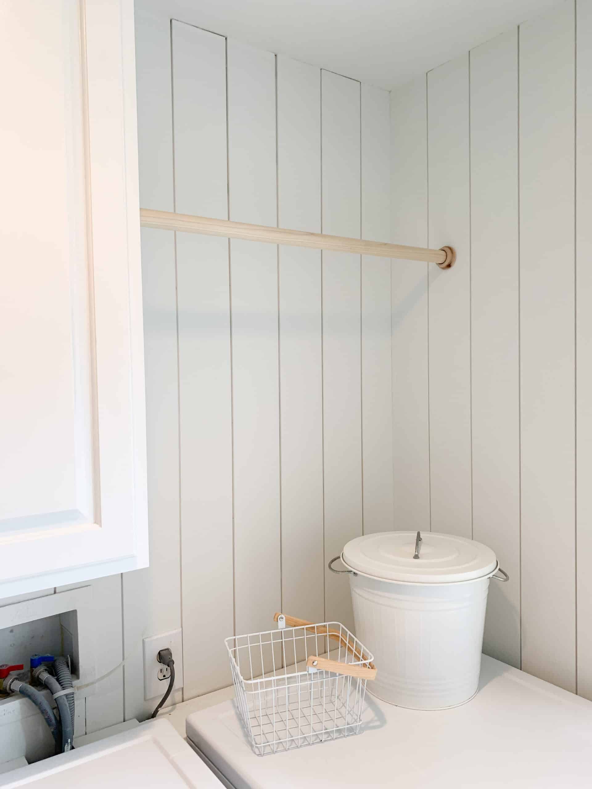 hanging wood bar in laundry room 