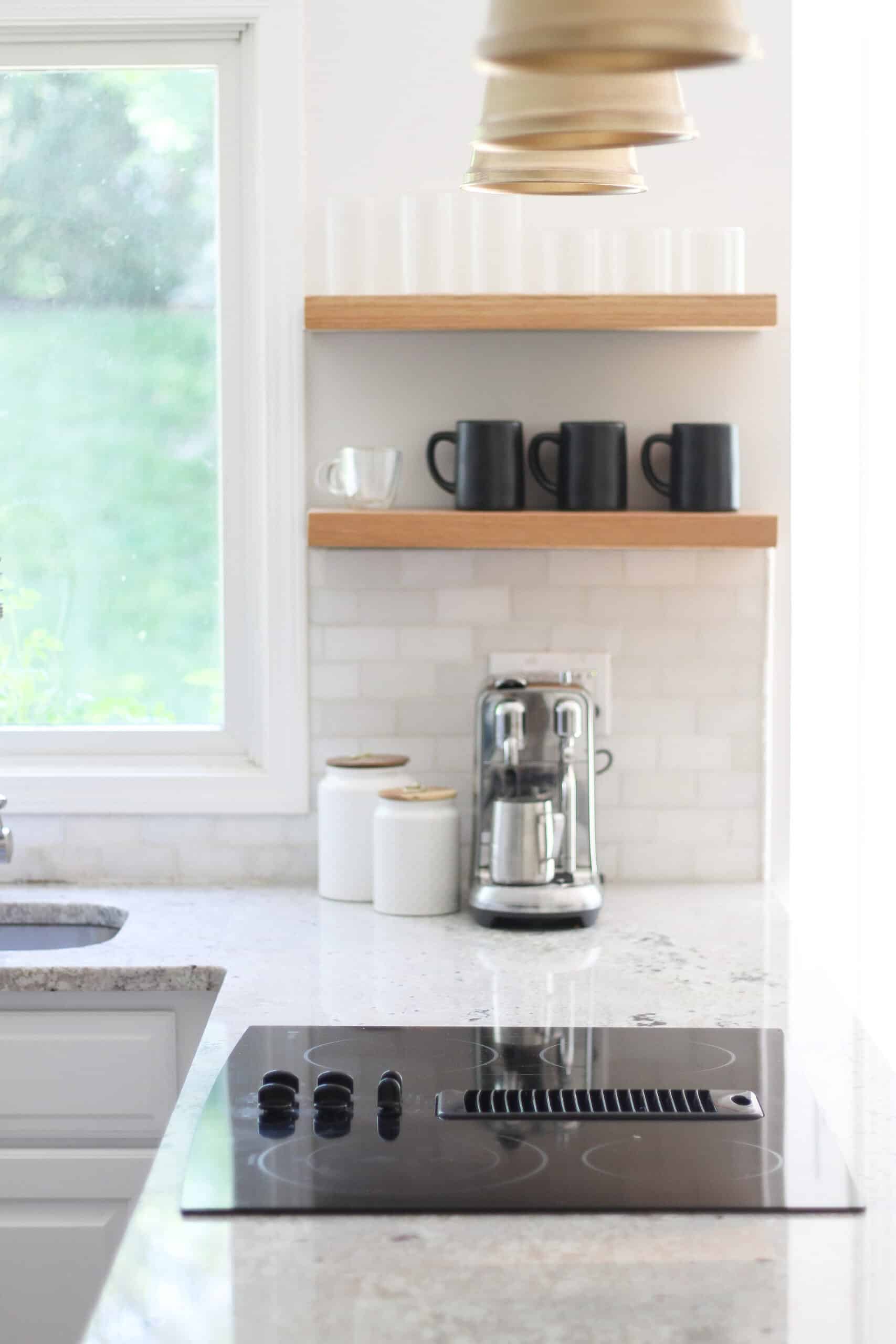 amazon cups and coffee cup in white kitchen