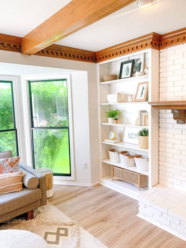 pocket of living room wth built in shelving 