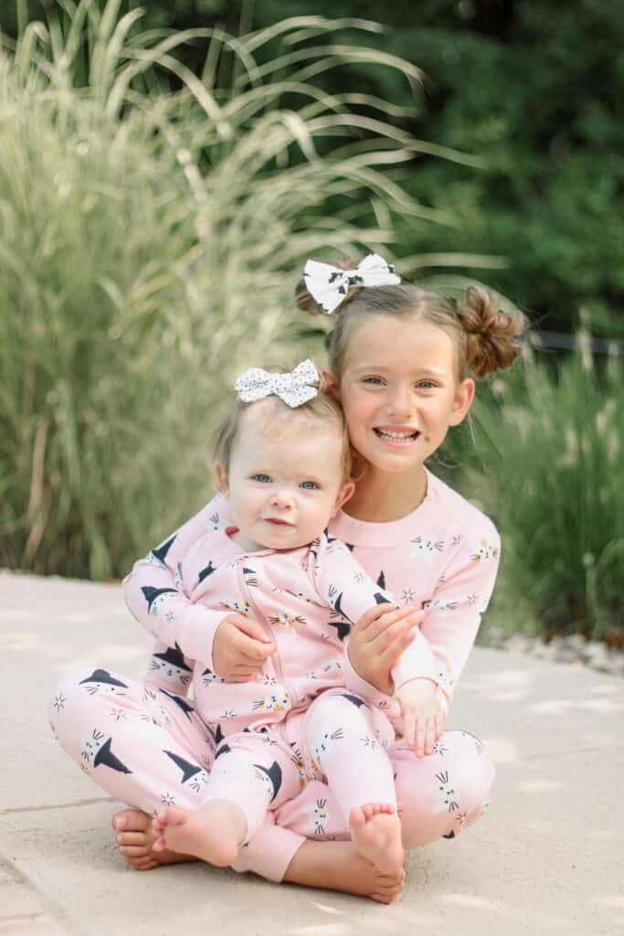 sister in matching Halloween Pajamas 