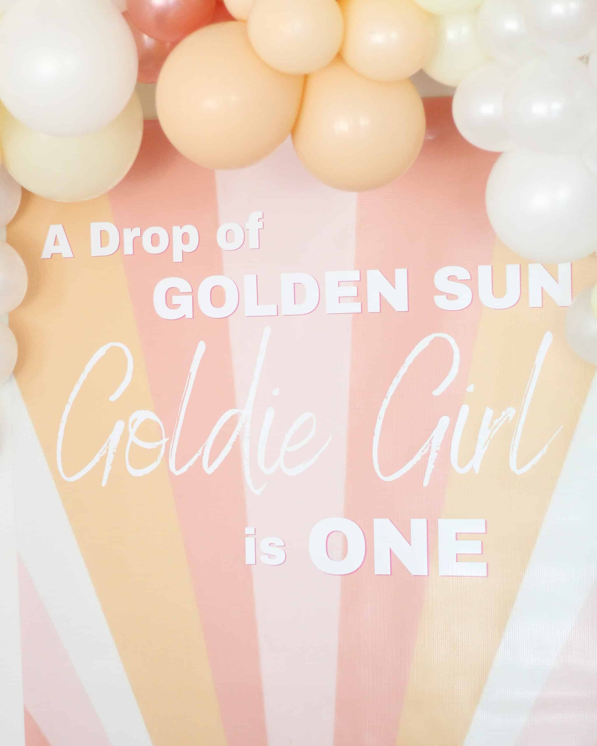 sunshine backdrop with balloon garland