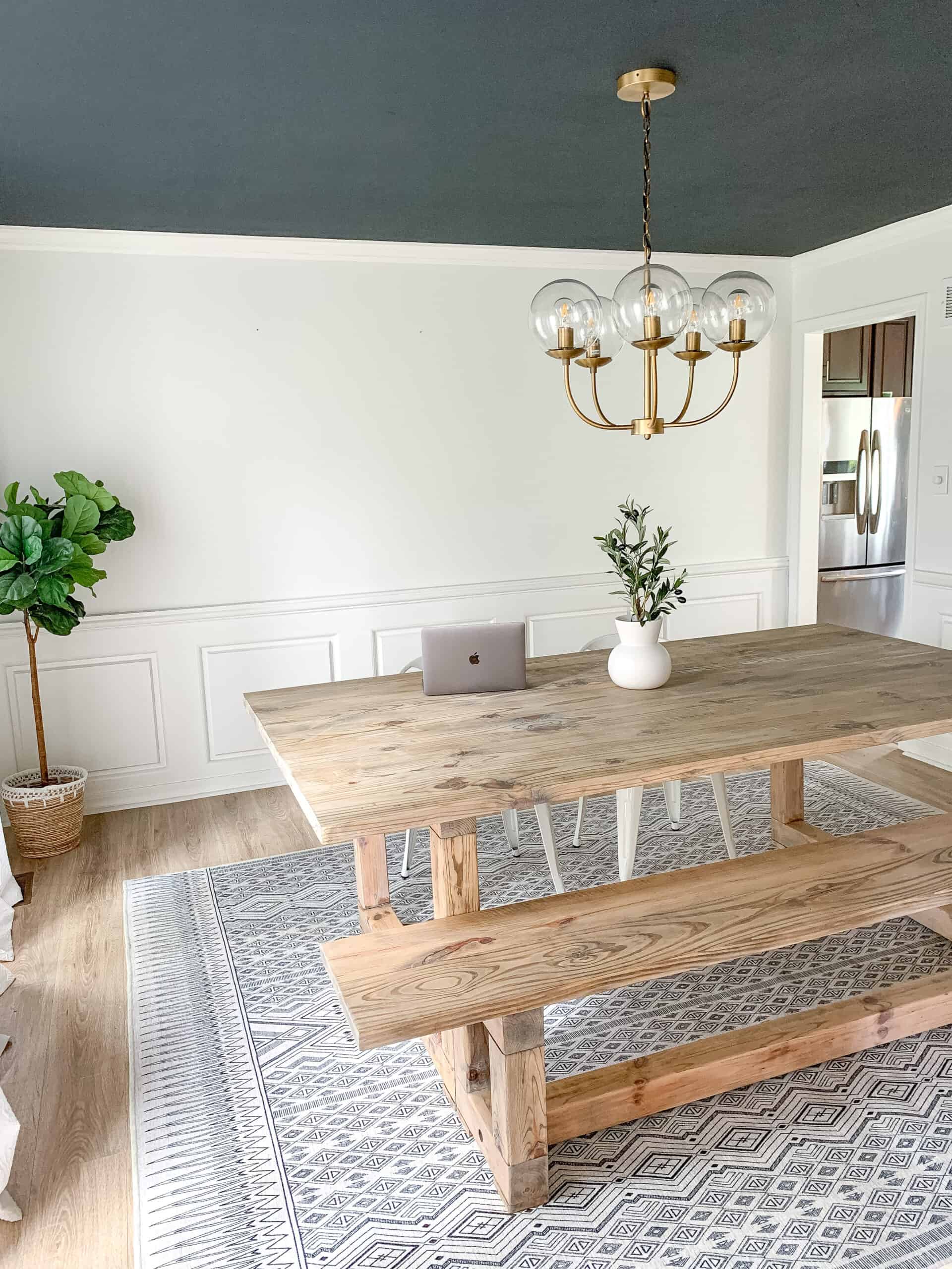 dining room with dark ceiling 