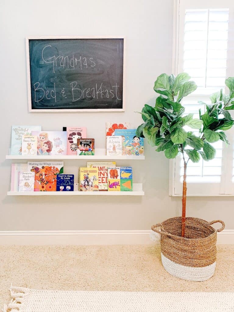 book ledges and chalkboard with fiddle leaf fig tree