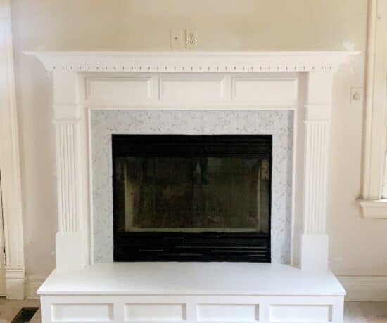 fireplace updated with peel and stick backsplash