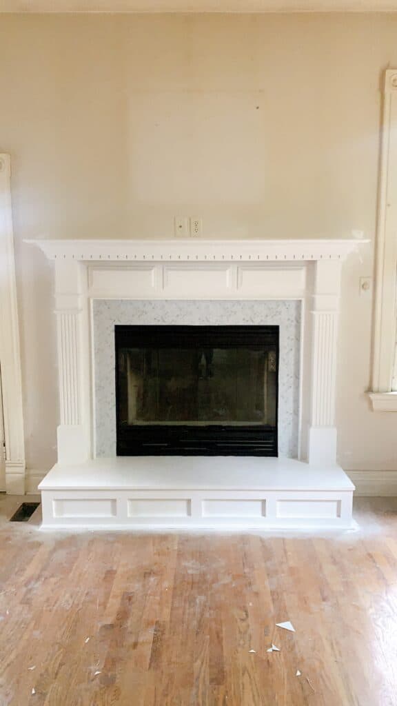 fireplace updated with peel and stick backsplash