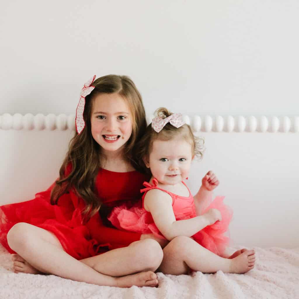 sisters in plum tutus 