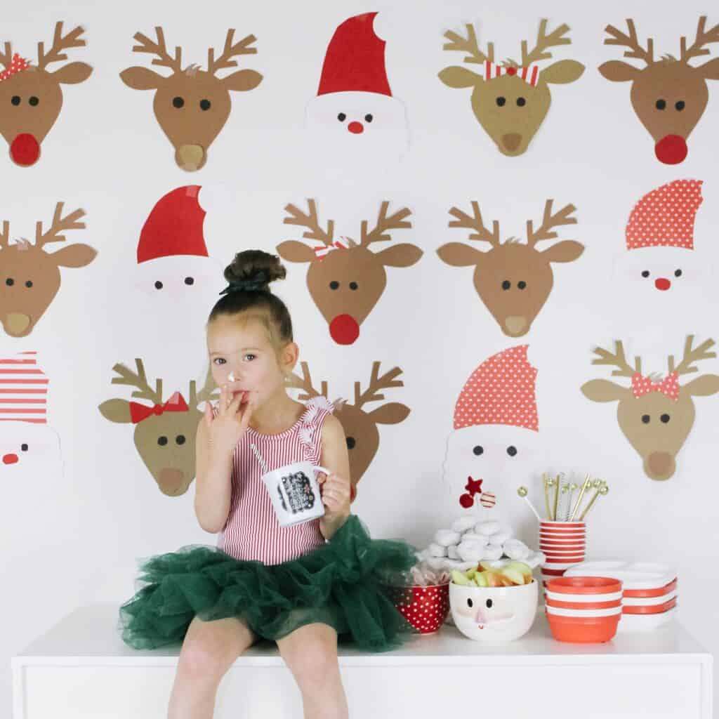 little girl with Santa wall