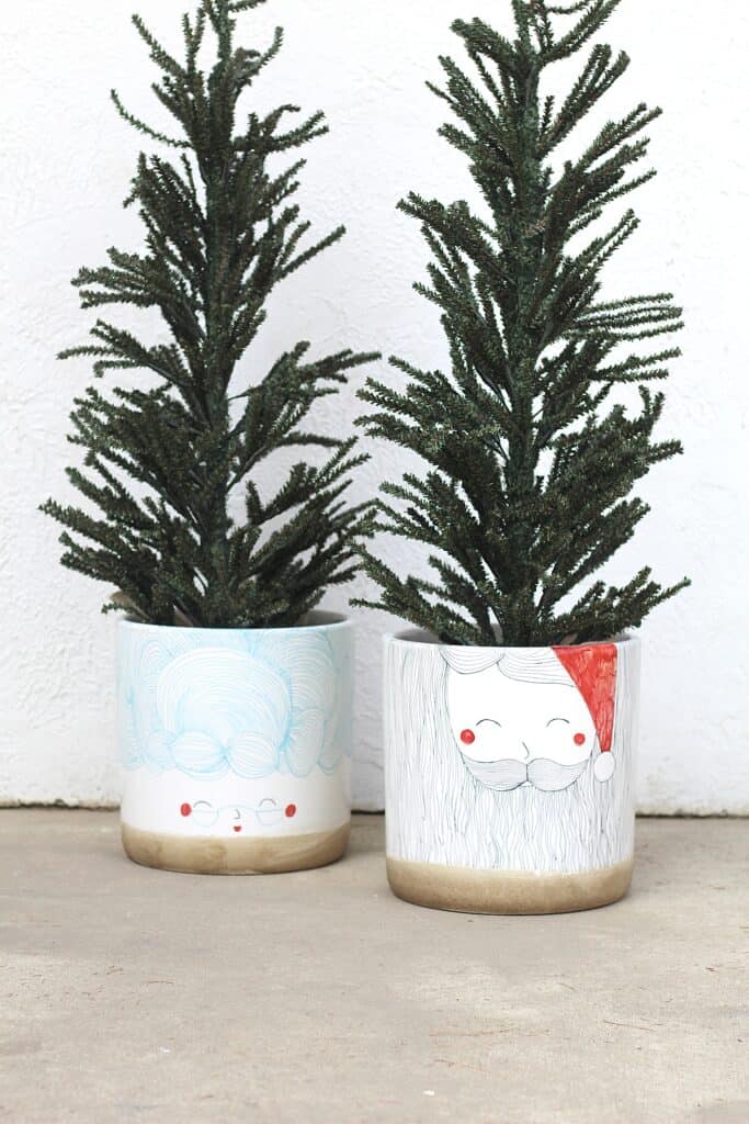 faux christmas trees in planters