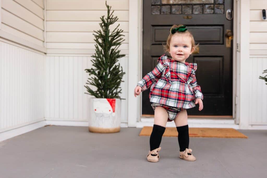 baby girl in christmas outfit 