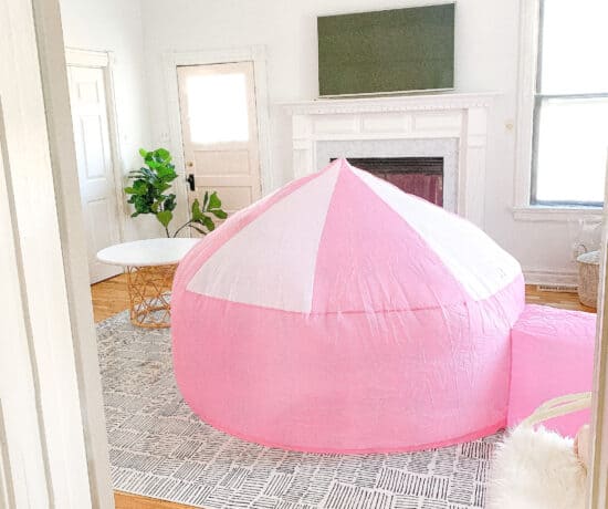 pink air fort in playroom