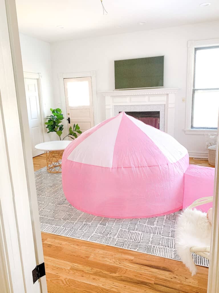 pink air fort in playroom 