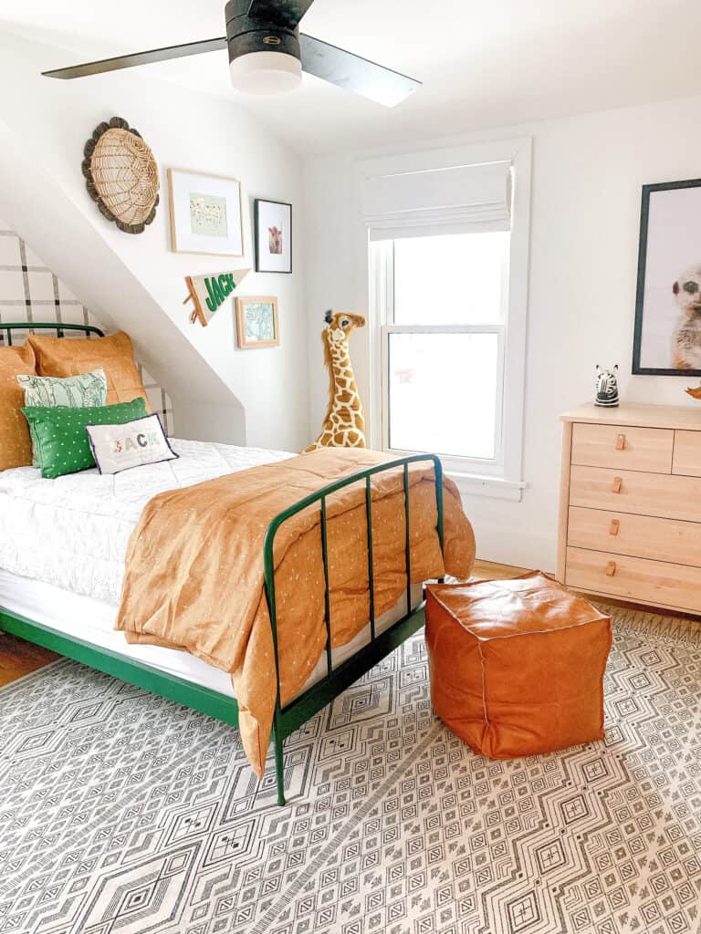 boys room in neutral colors with green