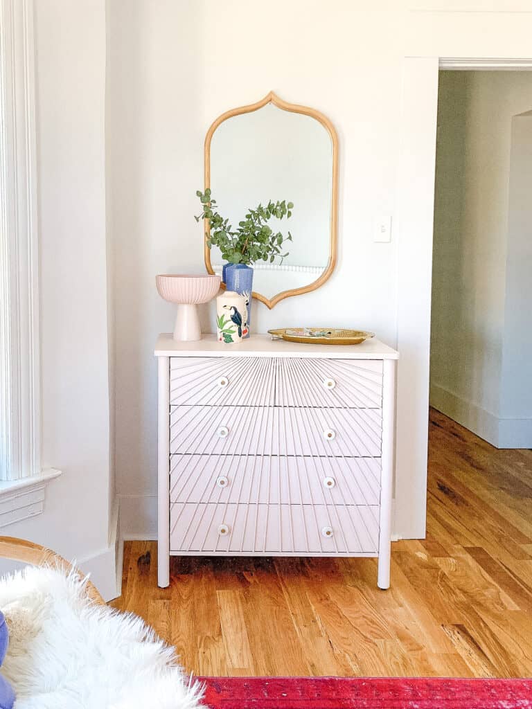 Pink Sunburst dresser done with wood dowels 