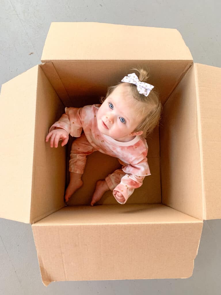 box with baby in it 