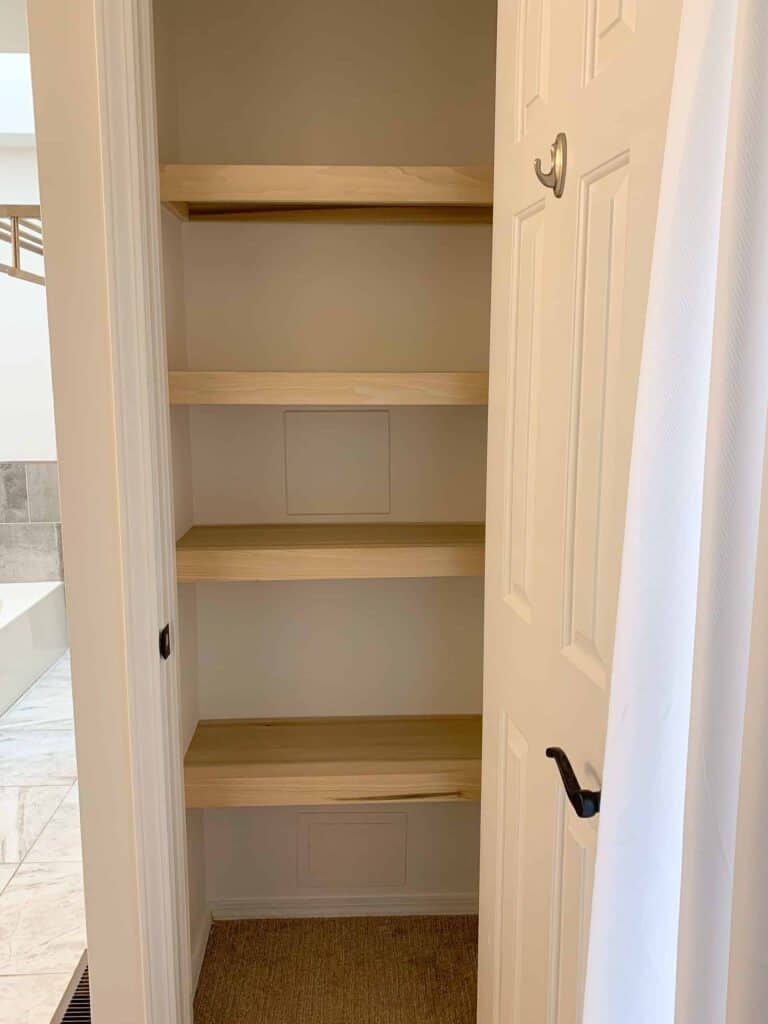 empty linen closet shelves