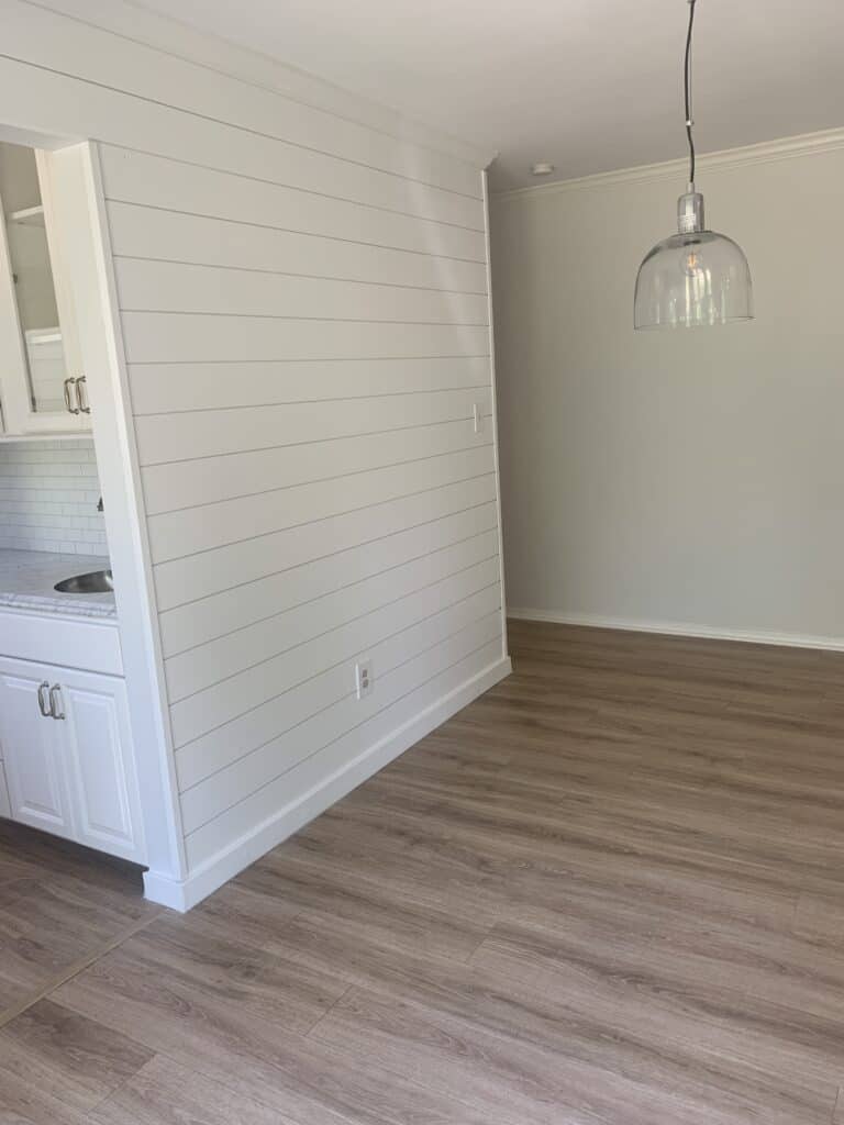 white shiplap wall in kitchen 