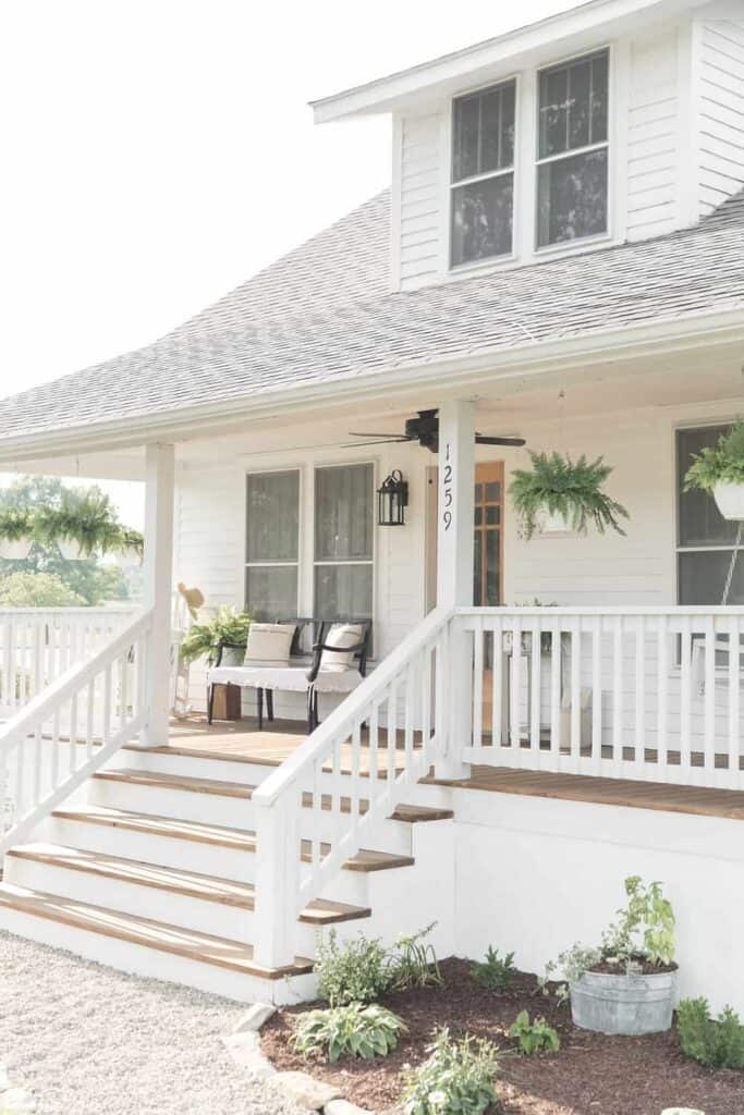 white and wood farmhouse front porch