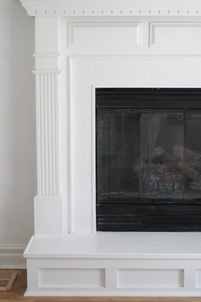 white penny tile fireplace