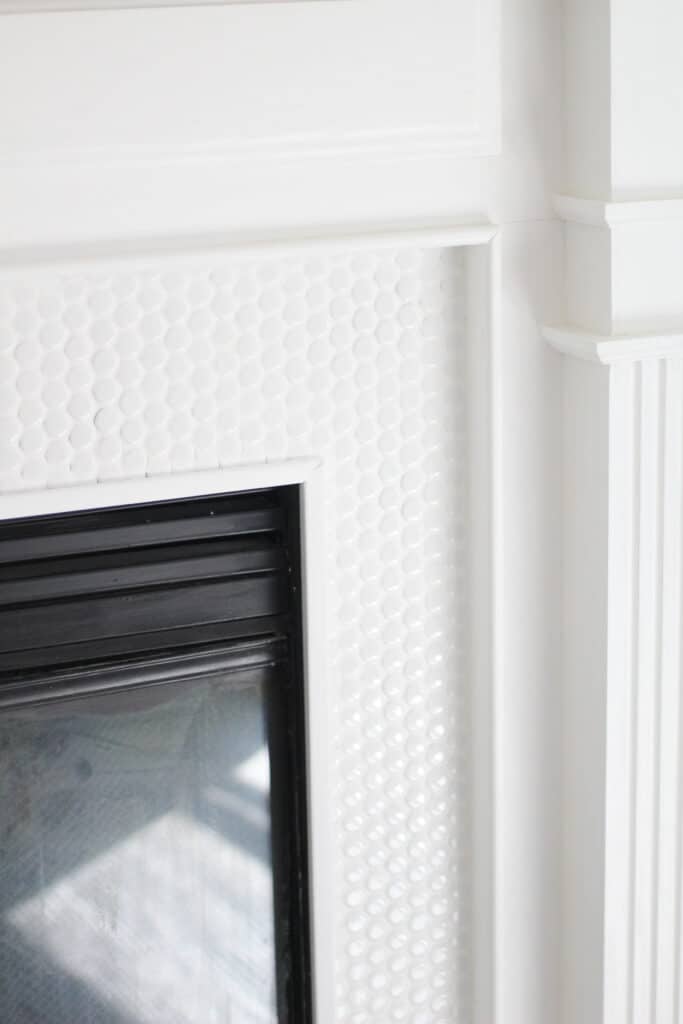 white penny tile fireplace 