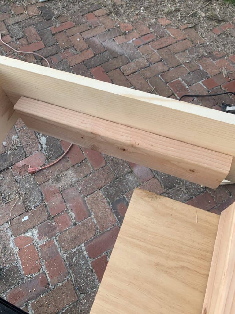 attaching supports inside porch swing frame 