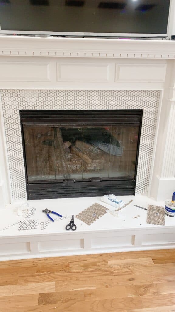 installing penny tile to a fireplace 