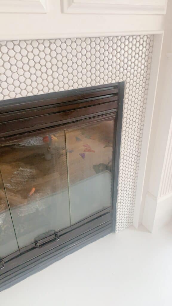 penny tile on a fireplace