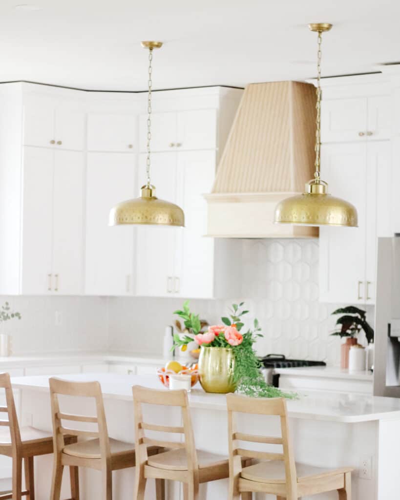 white kitchen with light wood accents