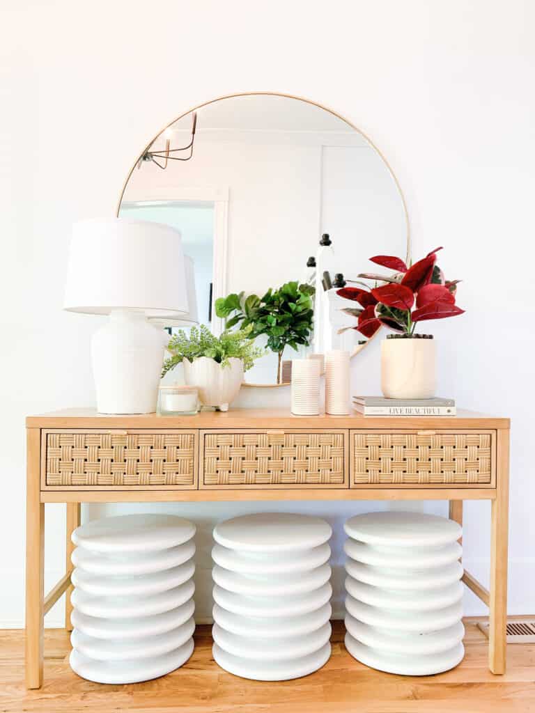 entryway stools under a table 