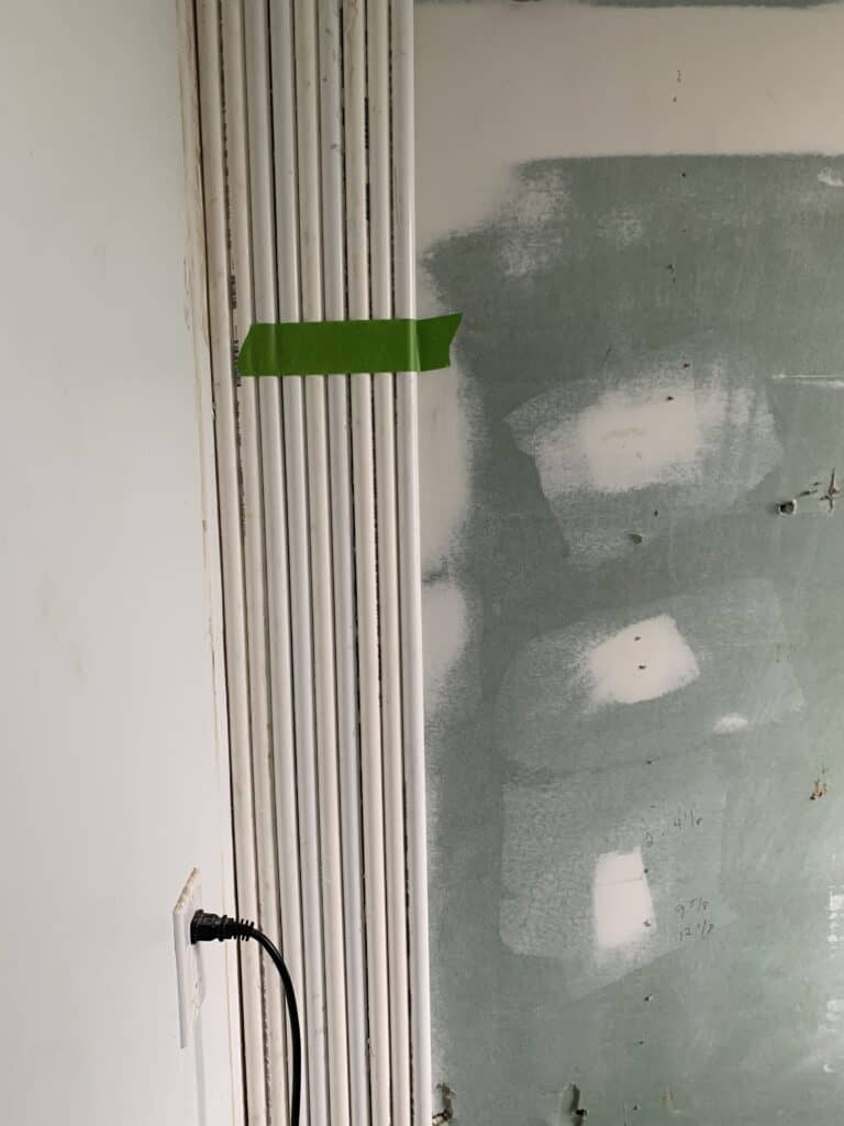 hanging PVC pipe on walls 