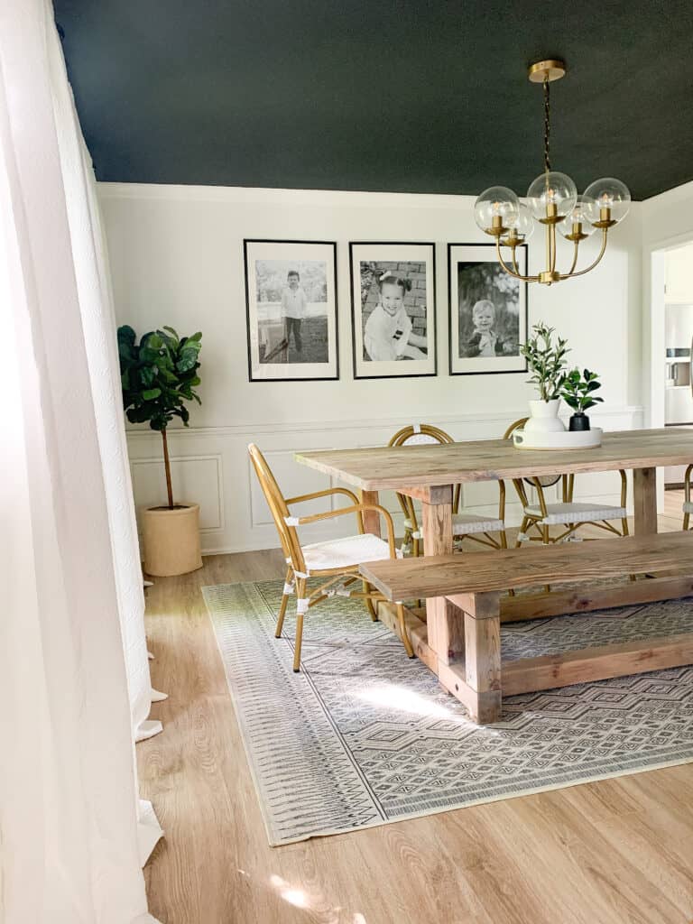 photo of dining room with dark ceiling