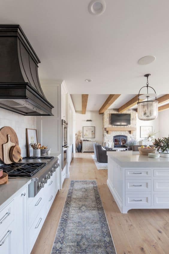 white kitchen with black hood