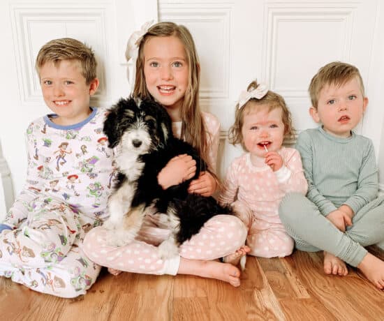 4 kids with their dog