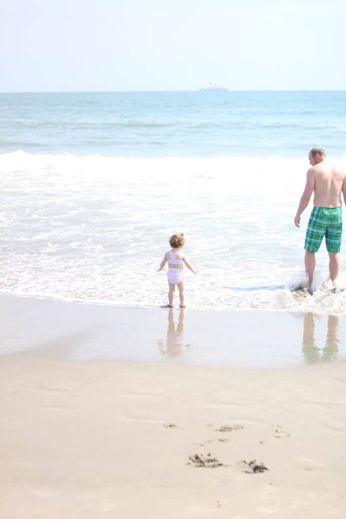 dad and baby girl at the beach