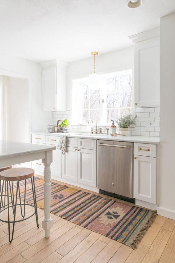 white kitchen with runner rug 