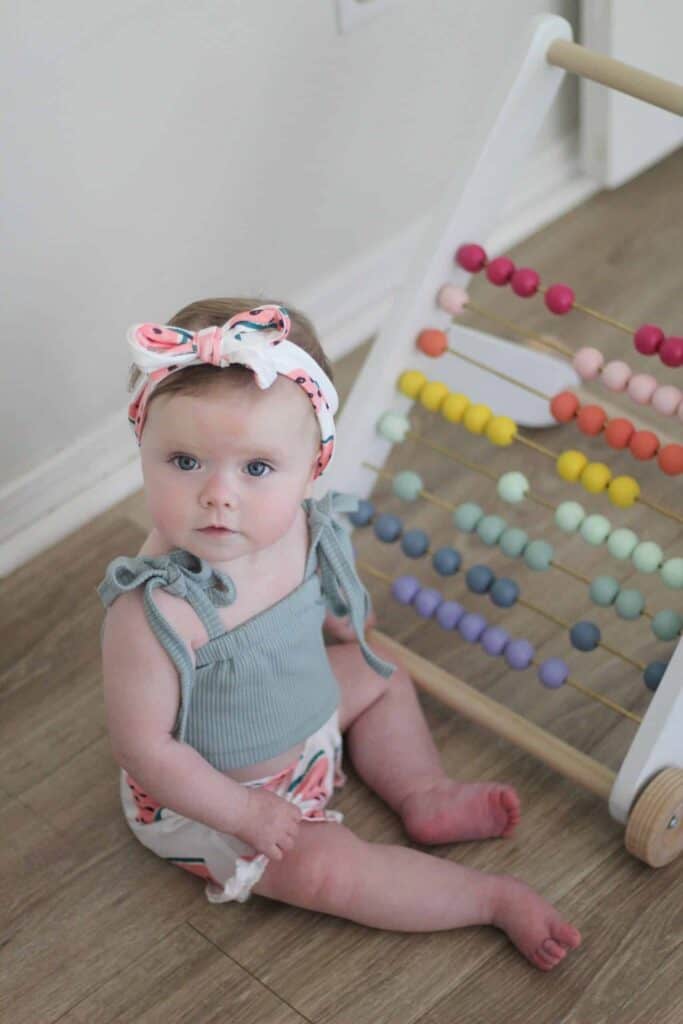 Toddler girl with DIY Push toy 