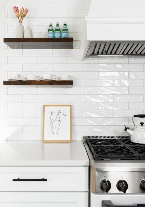 Black and White Kitchen with Glossy White Glass Tiles