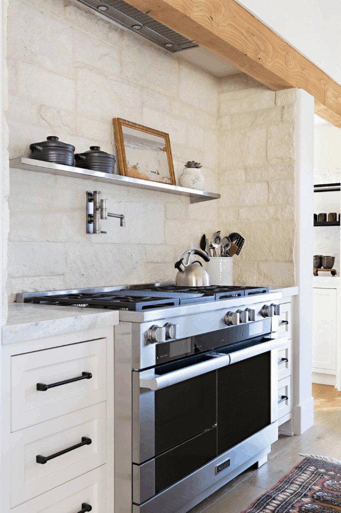 natural backsplash in white kitchen 