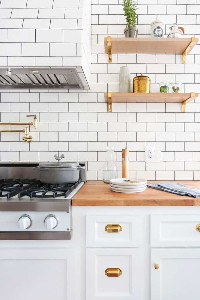 white backsplash with dark grout 